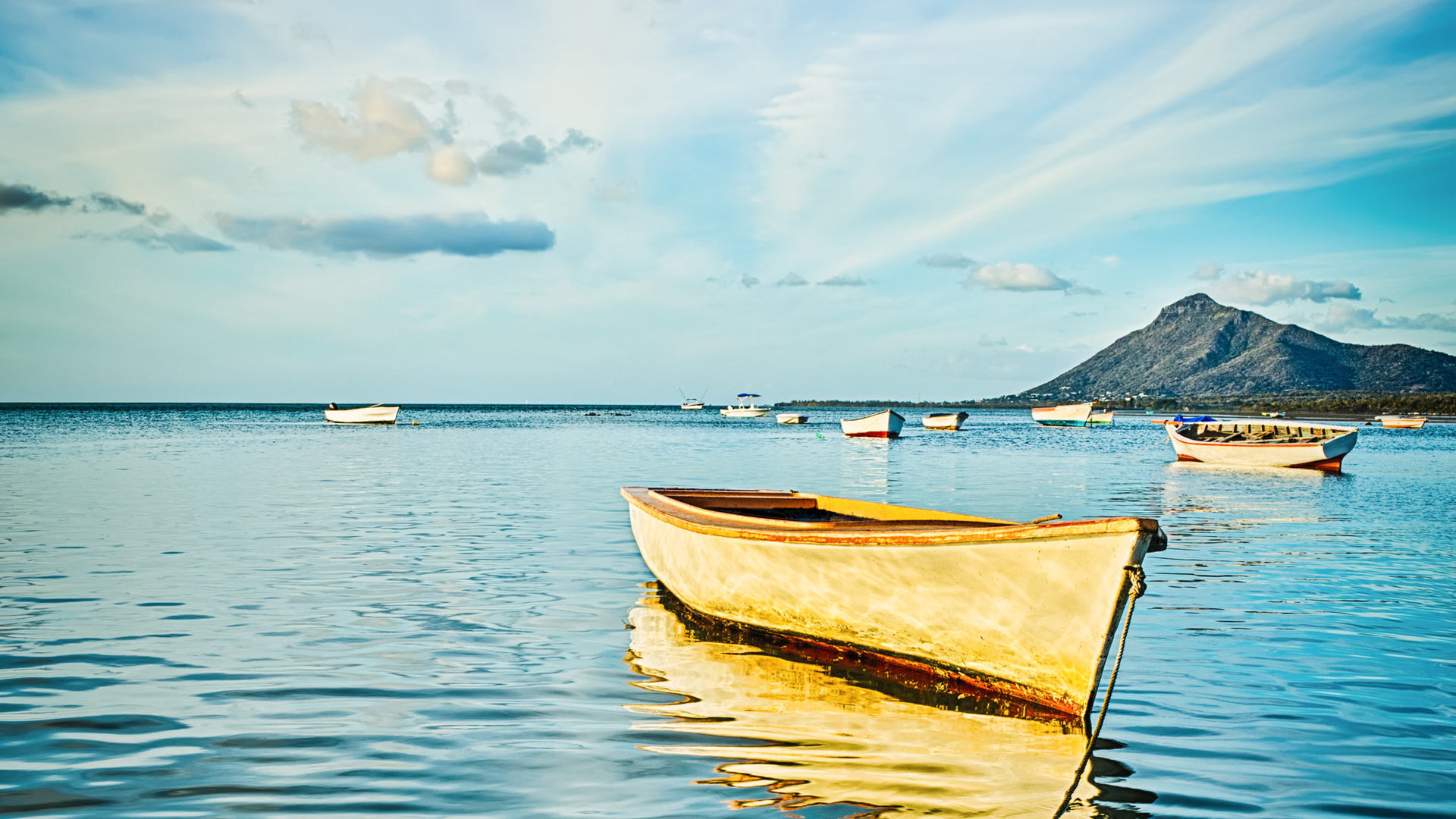 Fishing boats on calm water off the coast of Mauritius